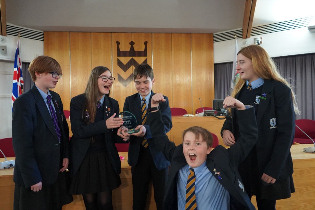 Pershore High School students happy with their vote for success Five students aged 14-15 looking very happy and excited with their trophy