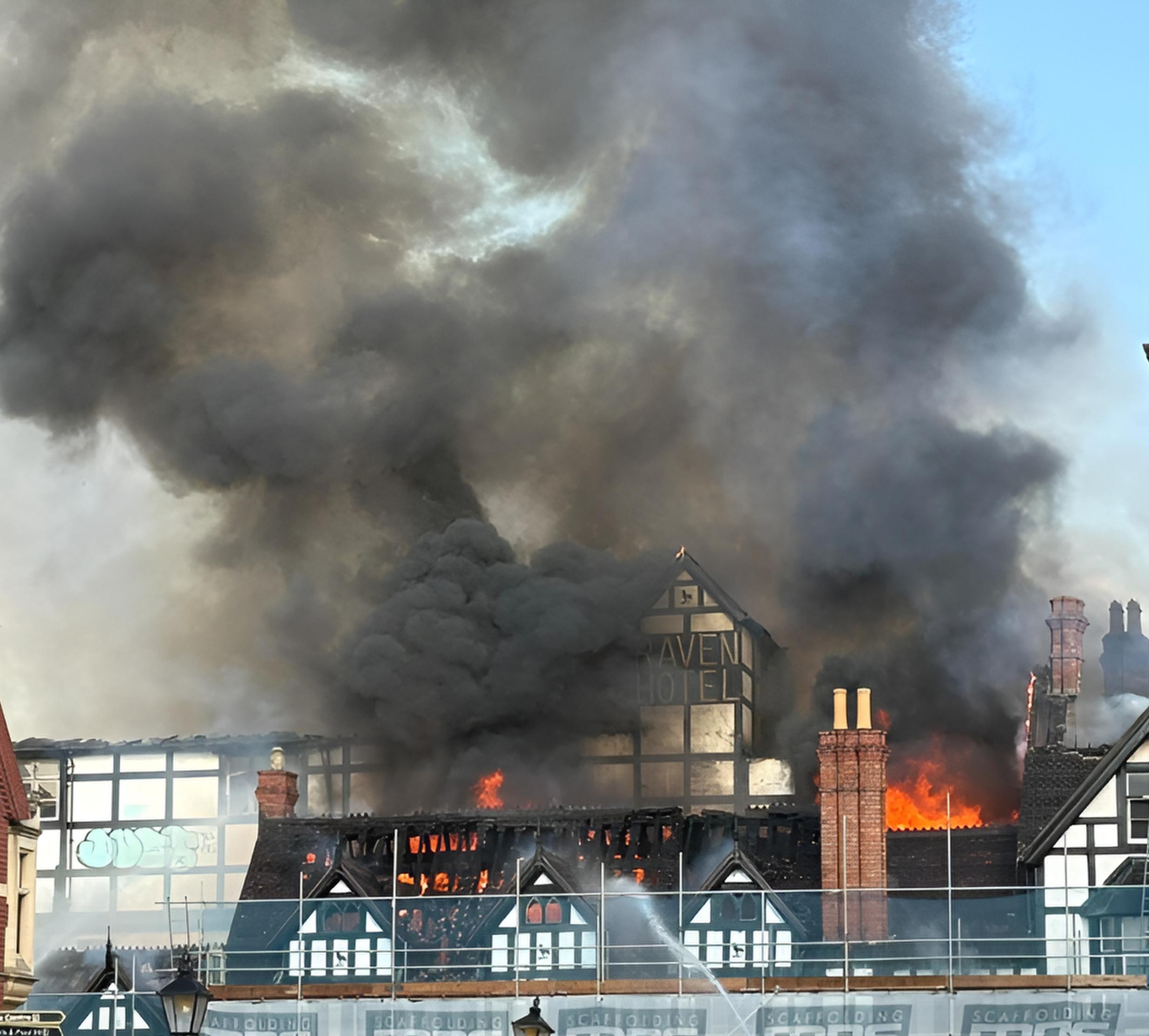 Smoke and flames coming from The Raven Hotel
