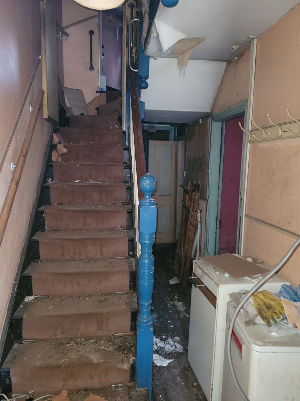 Neglected staircase inside a residential home